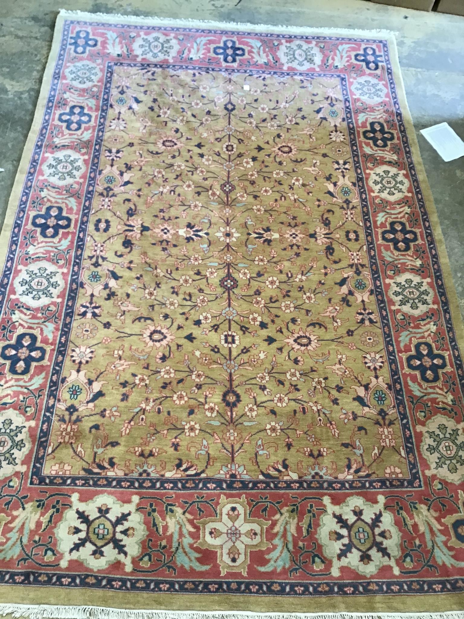 A Heriz style gold ground carpet, 370 x 244cm